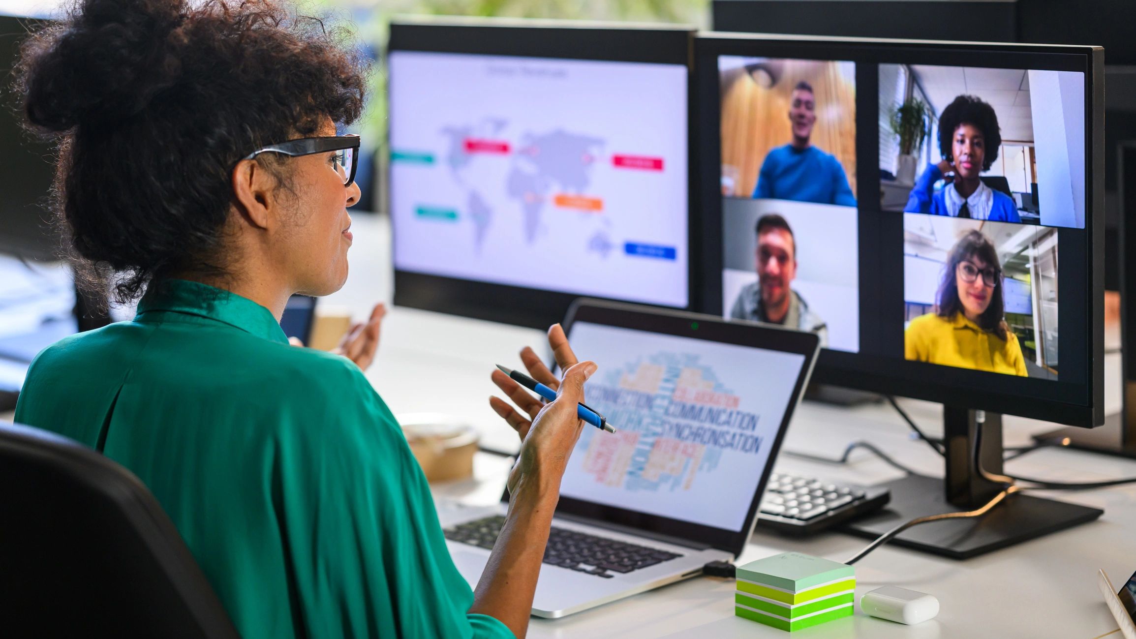 Business analyst discussing charts with remote team members